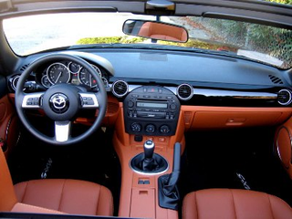 Illustration for article titled Jalopnik Reviews: 2007 Mazda MX-5 Miata Power Retractable Hardtop, Part 1